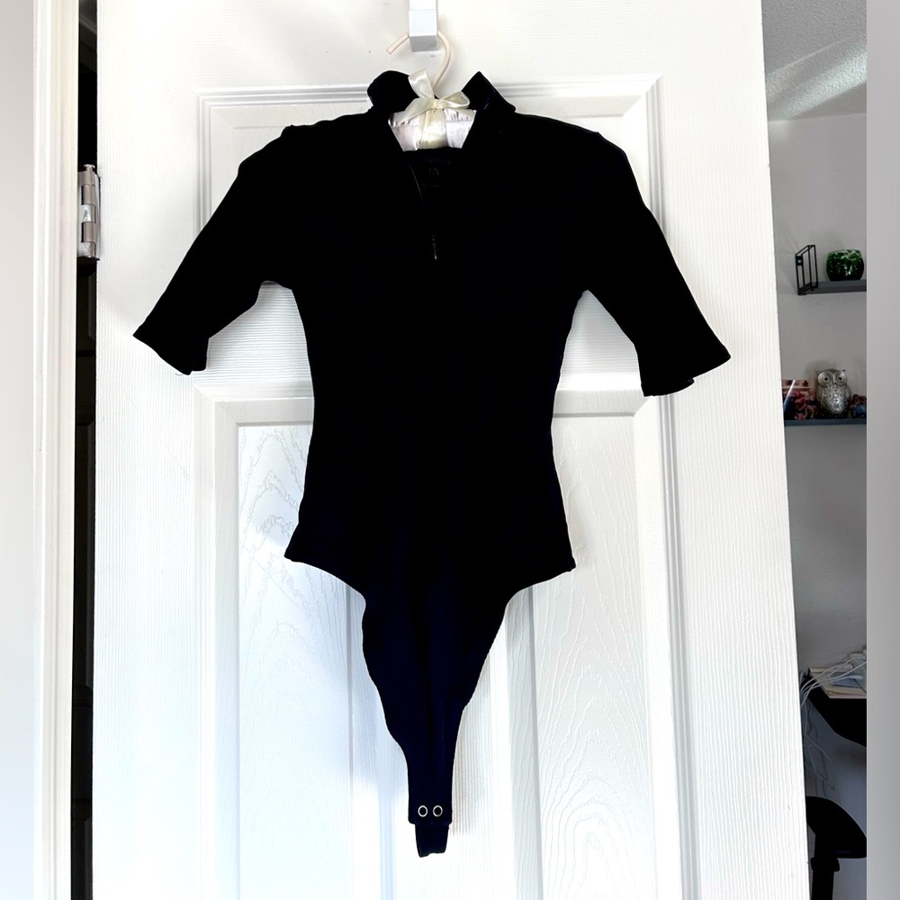 Good American sexy zip front ribbed black bodysuit